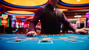Fortune Ox live-dealer table at qt777 apk showing card reveal and player interface